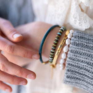 Edelstenen en Gouden Armbanden