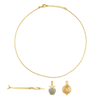 Gouden balletjes ketting met bedels