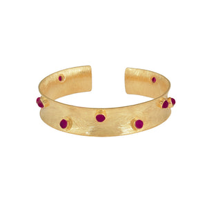 Gouden bangle armband met ruby steentjes