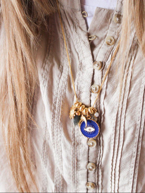 Gouden ketting met verschillende bedels