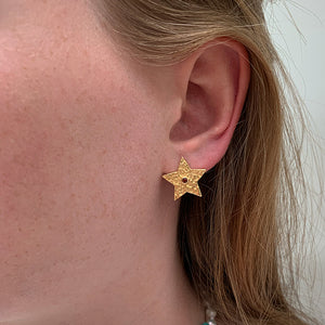 Gouden ster studs oorbellen