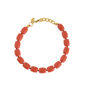 Koraal en gouden armbanden