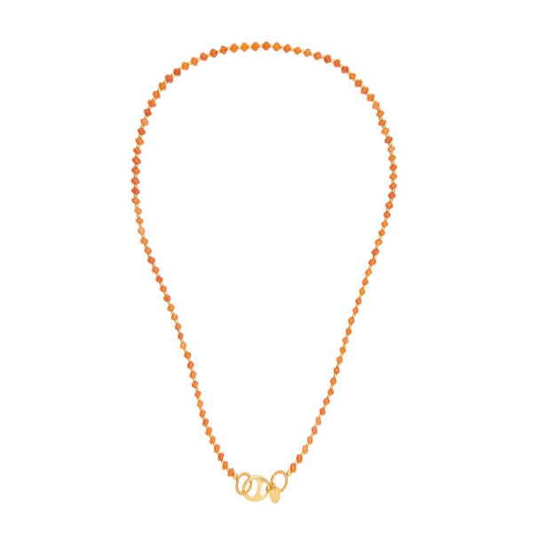 a necklace with alternating carnelian stones and a gold-plated bead with an oval lock for woman