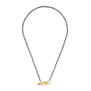 a necklace with alternating blue stones and a gold-plated bead with an oval lock for woman