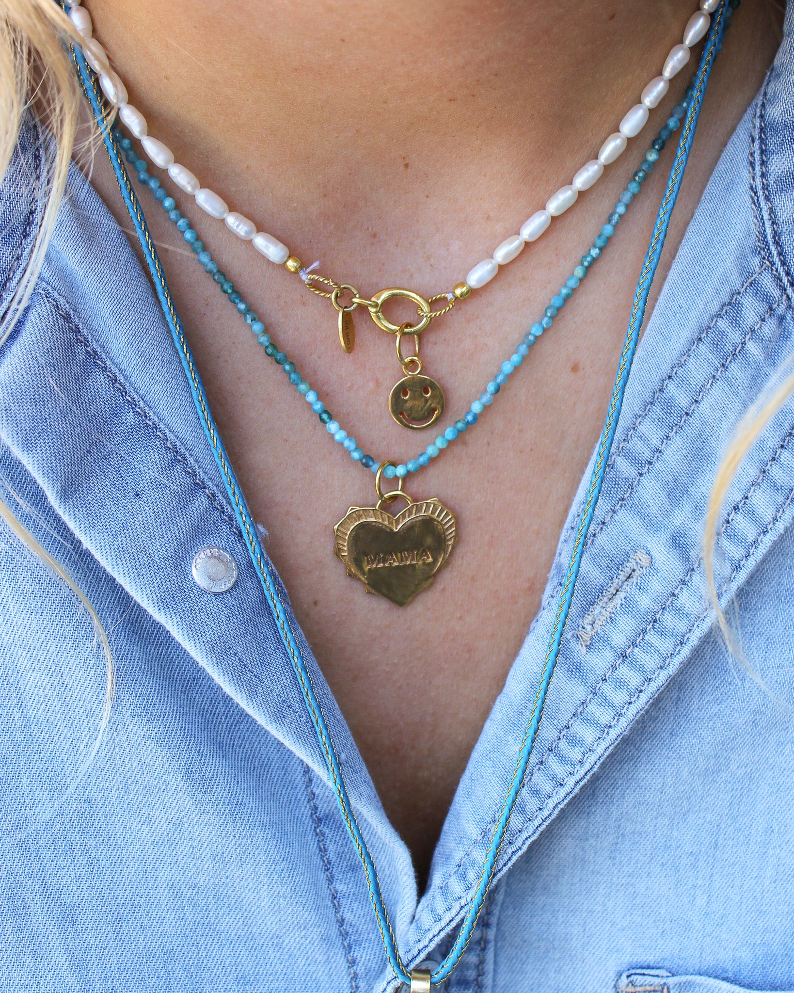 Parelketting met smileybedel