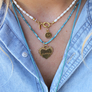 Parelketting met smileybedel