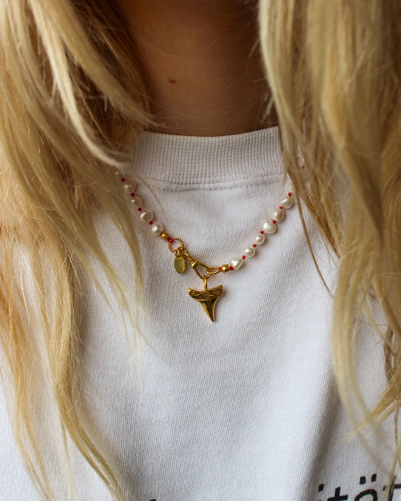 Parelketting_tandbedel
