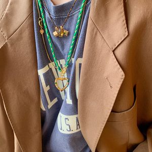 groen koord met hart bedel