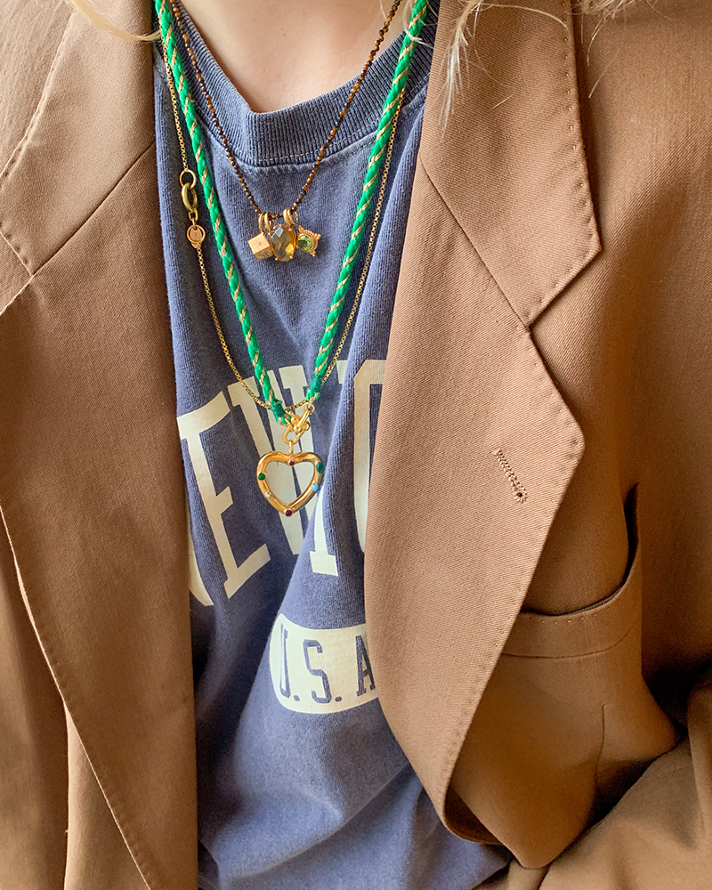 groen koord met hart bedel