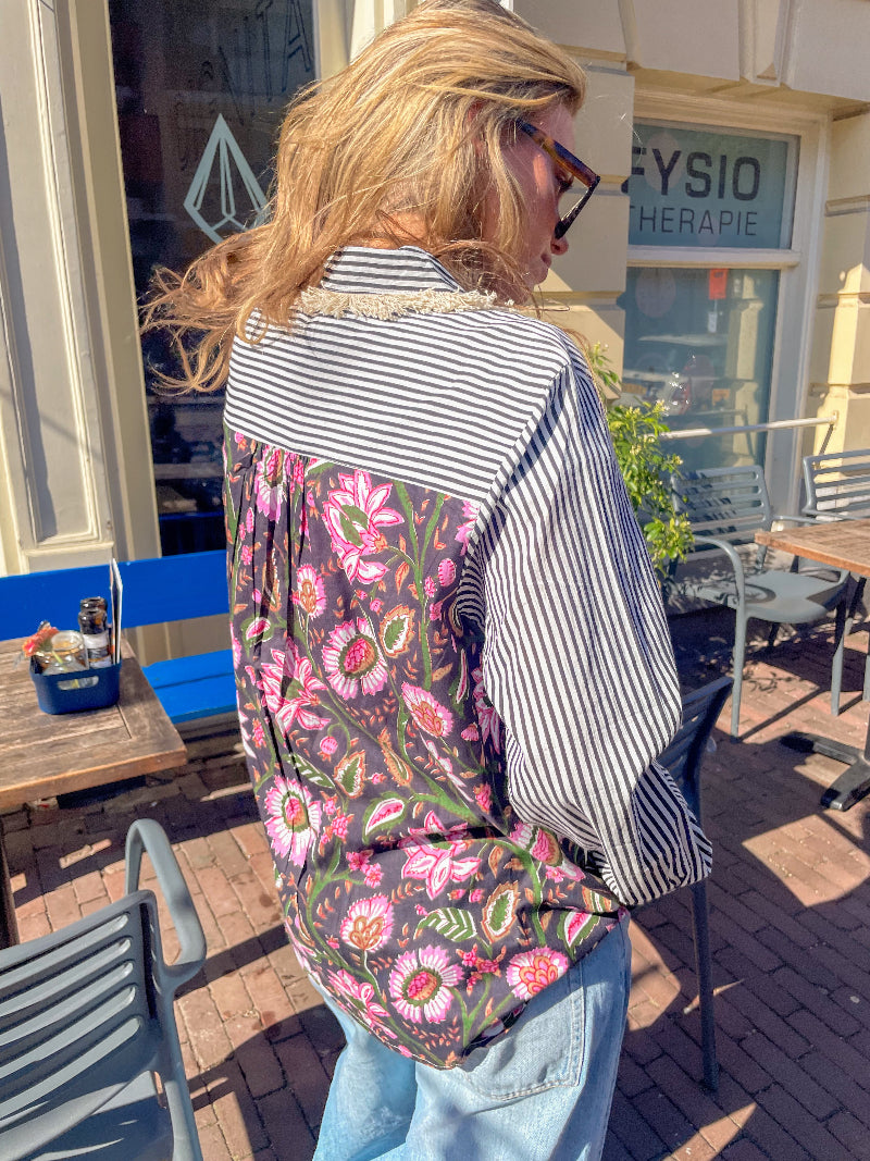 roze zwart witte blouse